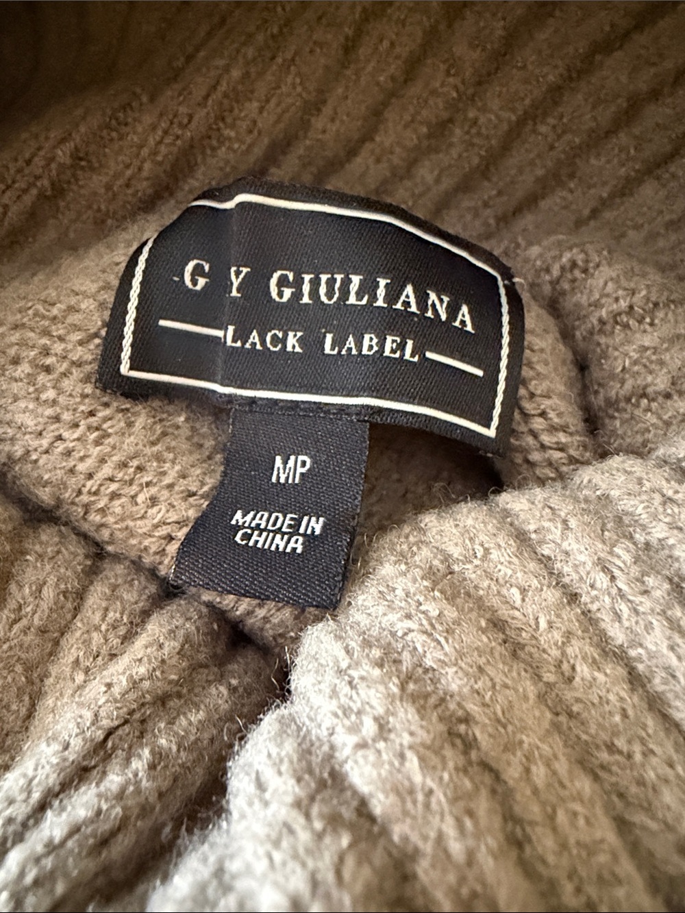 Woman’s Giuliana Sage turtle neck long sweater